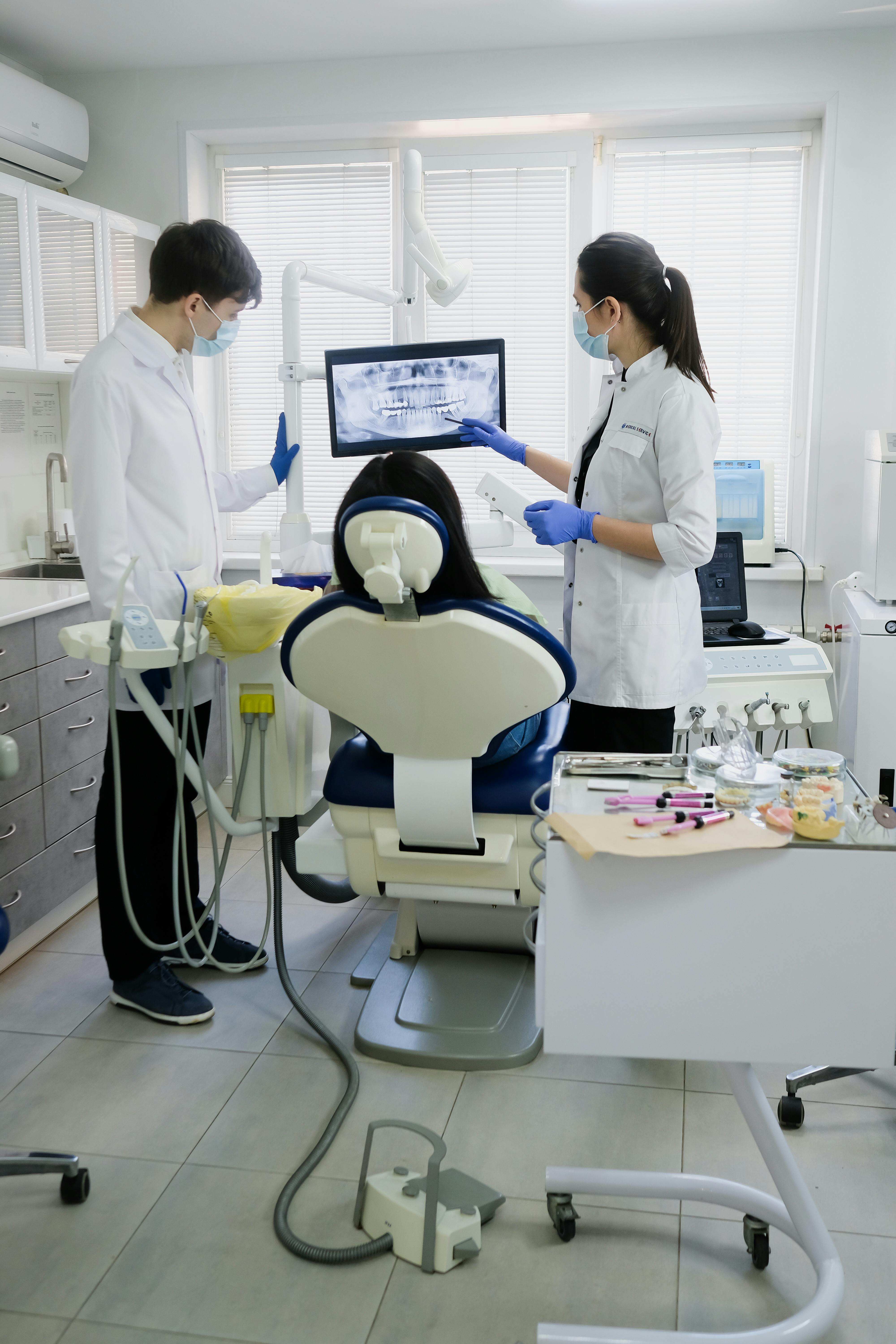 Dental team reviewing patient information